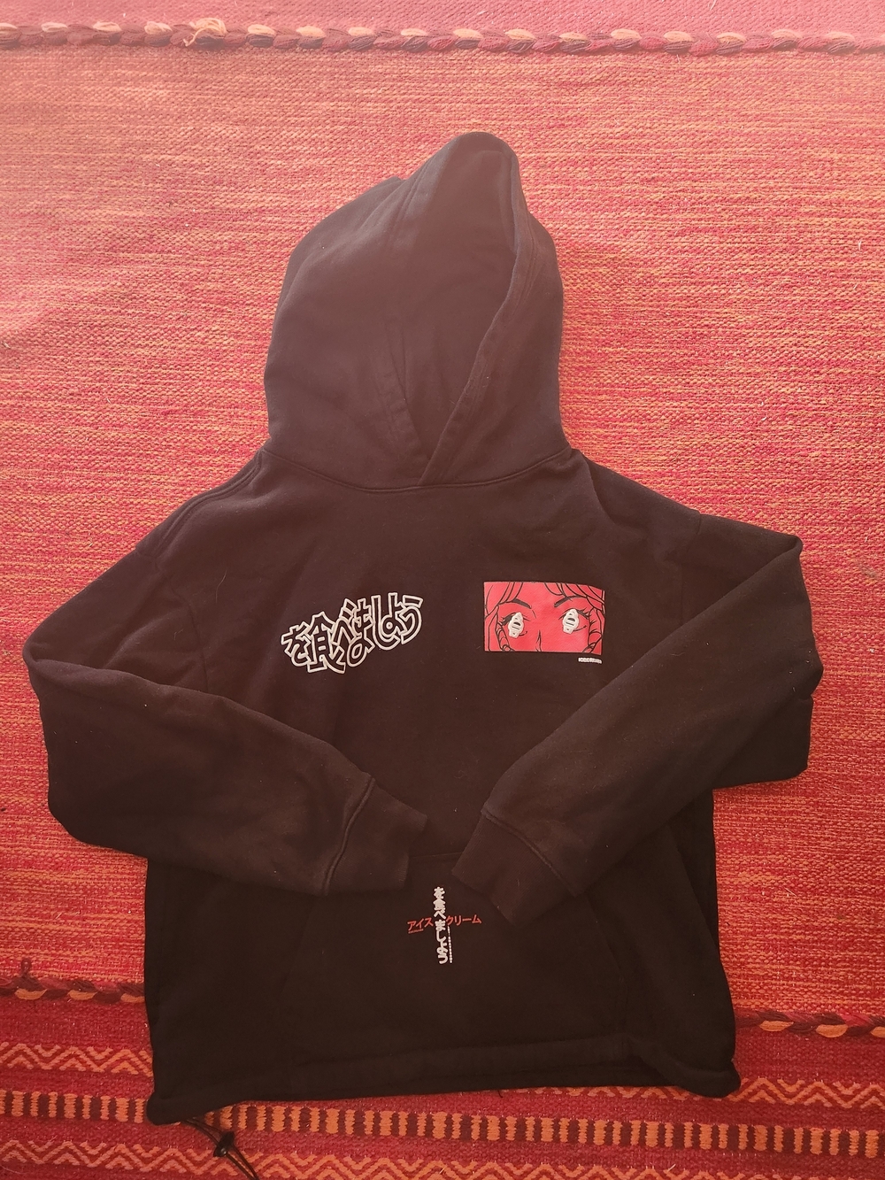 Black Graphic Hoodie with Red Accent